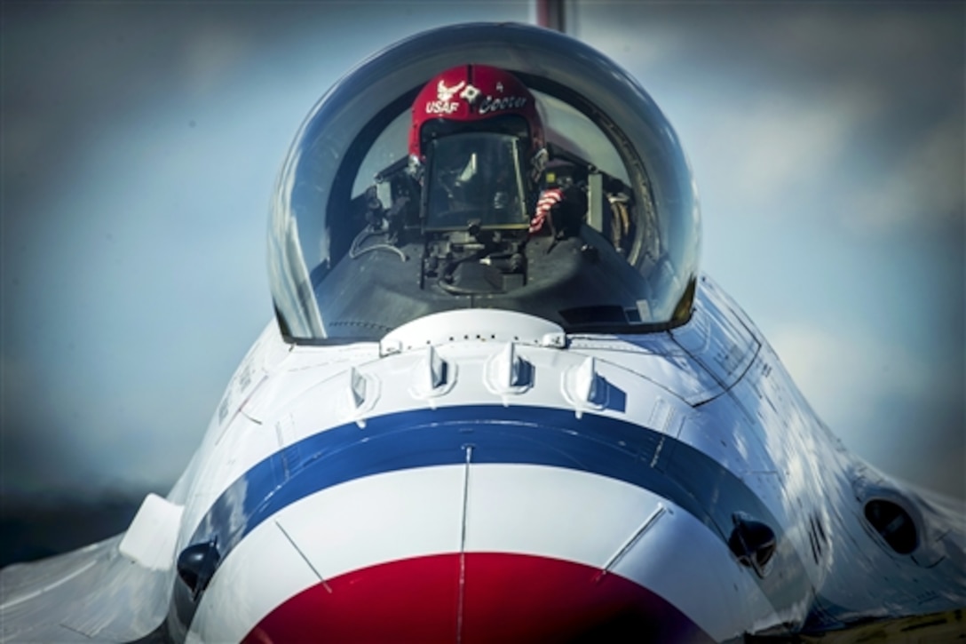 Air Force Maj. Curtis Dougherty prepares to taxi his F-16 Fighting Falcon aircraft for takeoff during a practice show in Kalispell, Mont., Aug. 29, 2014. Dougherty is a pilot assigned to the U.S. Air Force Thunderbirds air demonstration team.