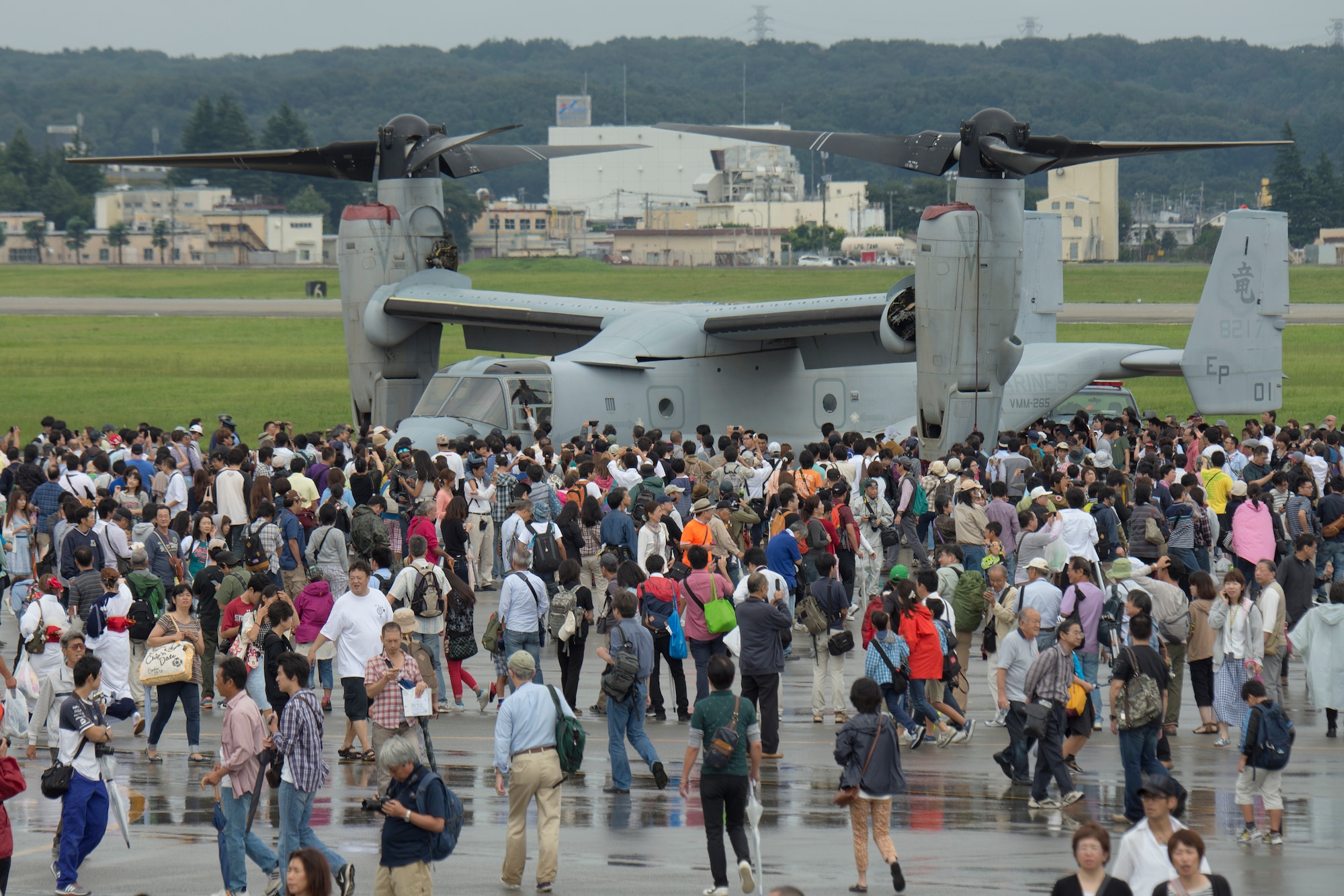 148,000 visitors attended Yokota Air Base Japanese-American Friendship Festival Sept. 6-7, 2014. The main attraction was two MV-22 Ospreys assigned to VMM-265, 1st Marine Aircraft Wing, 3rd Marine Expeditionary Force. The festival is designed to bolster the bi-lateral relationship shared between the United States and Japan. (U.S. Air Force photo by Osakabe Yasuo/Released)