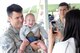 US Air Force Senior Airmen Thomas Blake pose for a photo with his child at Hancock Field in Syracuse, NY on Sept. 6, 2014. Blake and family attended the 174th Attack Wing’s family day where military members and their family spent the afternoon enjoying, food, games and music at this annual event. (US Air Force Photo by New York Air National Guard Tech. Sgt. Justin A. Huett)