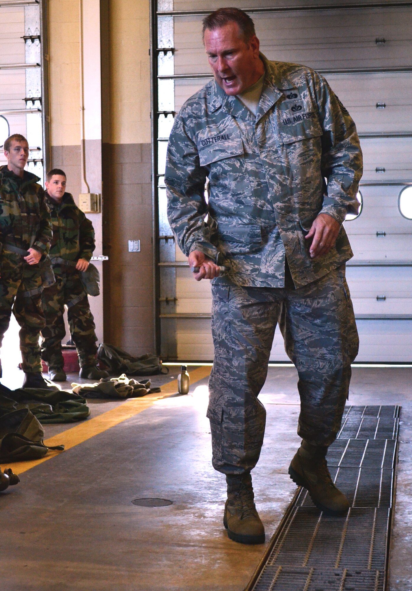 Tech. Sgt. Timothy Cotterall, CBRNE instructor for the 137th ARW, demonstrates the use of the Antidote Treatment, Nerve Agent, Autoinjector.  The ATNAA is a single autoinjector that contains antidotes to neutralize certain nerve agents. (Official Air Force photo by Airman 1st Class Brigette Waltermire/Released)