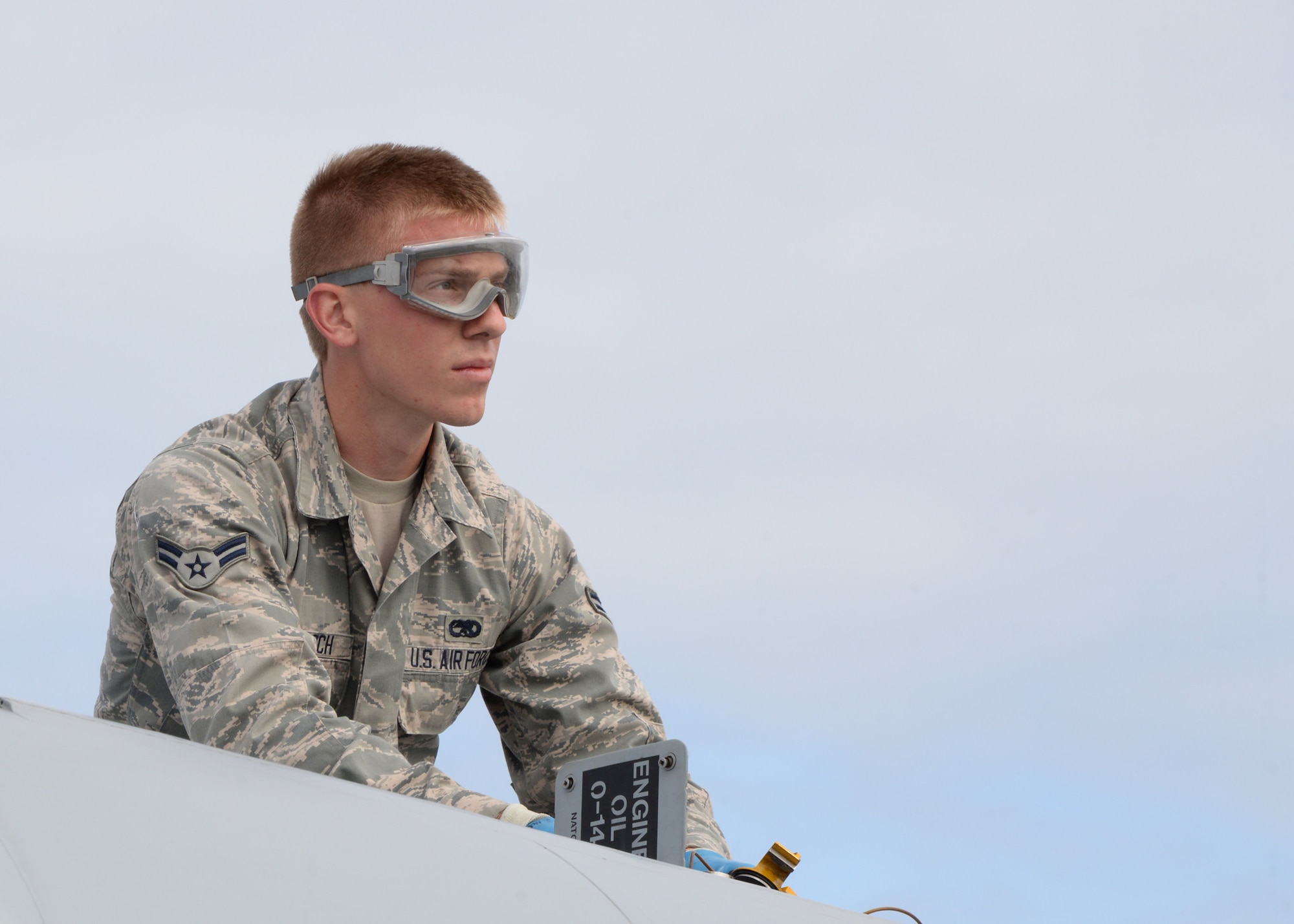 Airman 1st Class John McCulloch, A-10 Crew Chief, 175th Maintenance Squadron, Maryland Air National Guard, works on an A-10C during Exercise Red Flag – Alaska 14-3, Eielson Air Force Base, Ak. Exercise Red Flag – Alaska is a 10 day exercise that is a series of Pacific Air Forces commander-directed field training exercises for U.S. forces, provides joint offensive counter-air, interdiction, close air support, and large force employment training in a simulated combat environment. (Air National Guard photo by Senior Master Sgt. Ed Bard/RELEASED)