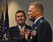 Col. Robert Mortensen, deputy director operations and plans at Tenth Air Force, retires from duty during a ceremony Sep. 6, 2014, Naval Air Station Fort Worth Joint Reserve Base, Texas. He previously served as vice-commander of the 301st Fighter Wing from 2008 to 2010. (U.S. Air Force photo by Staff Sgt. Samantha Mathison)