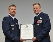 Col. Robert Mortensen, deputy director operations and plans at Tenth Air Force, retires from duty during a ceremony Sep. 6, 2014, Naval Air Station Fort Worth Joint Reserve Base, Texas. He previously served as vice-commander of the 301st Fighter Wing from 2008 to 2010. (U.S. Air Force photo by Staff Sgt. Samantha Mathison)