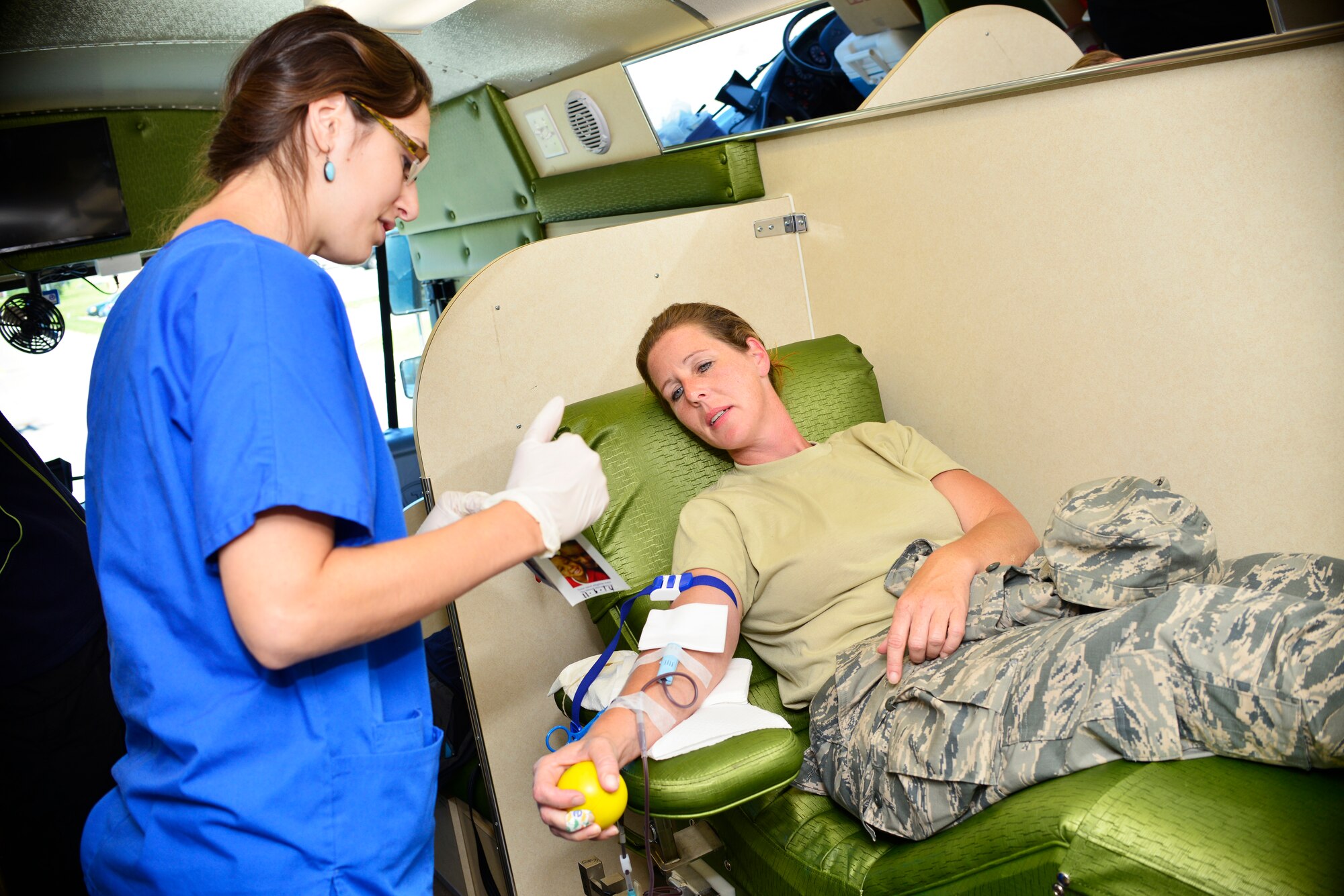 Tech Sgt. Amy Dowdall, 914th Force Support Squadron, donates blood to Upstate New York Transplant Services (UNYTS), September 7, 2014, Niagara Falls Air Reserve Station, N.Y. Dowdall's donation will save up to three lives in the Western N.Y. area. (U.S. Air Force photo by Staff Sgt. Stephanie Sawyer) 