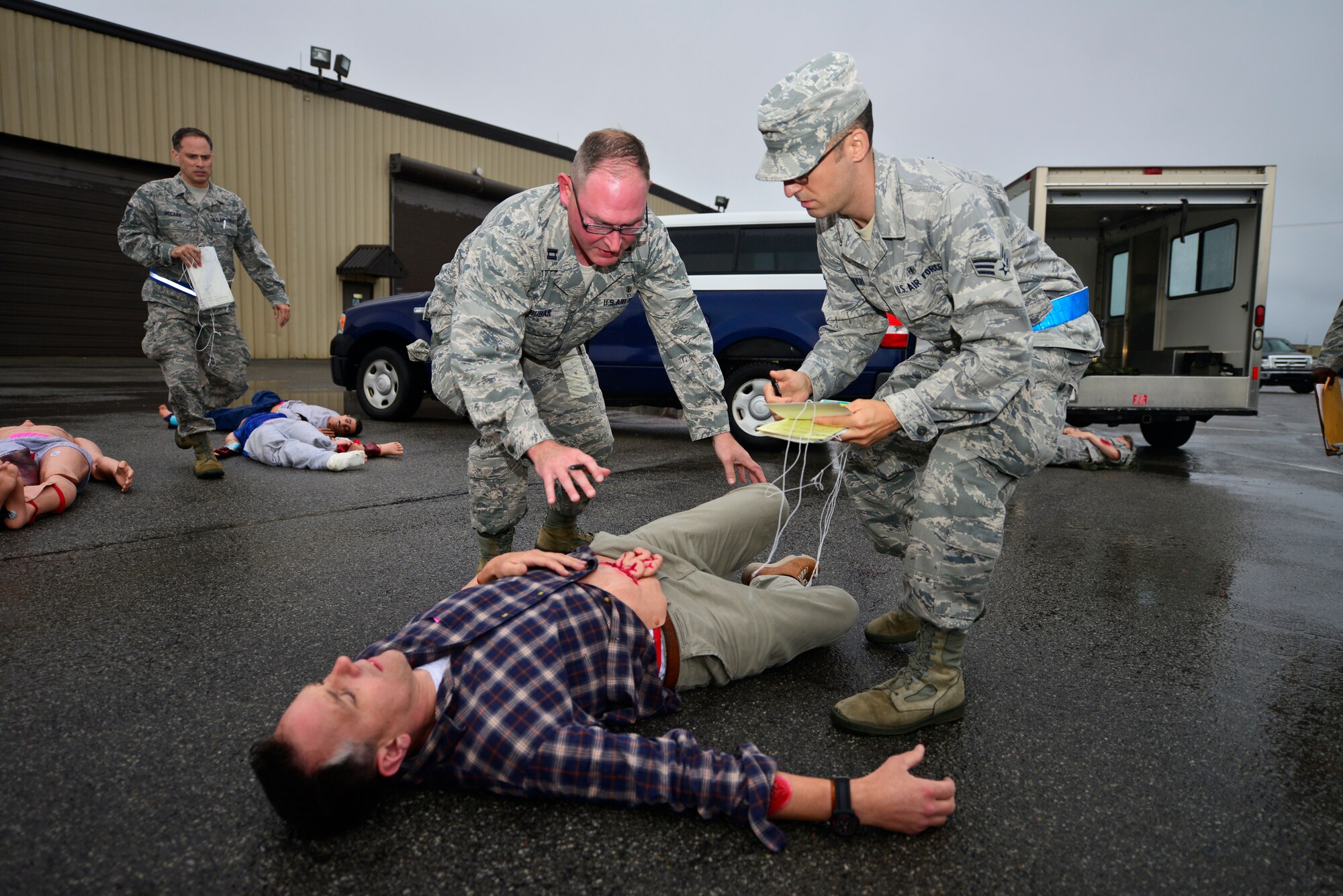 Members of the 914th Aeromedical Staging Squadron participate in Operation Cold Front, here at Niagara Falls Air Reserve Station, N.Y., September 6, 2014. This exercise serves as an opportunity to evaluate participants on their ability to respond to operational needs and demonstrate mission execution capabilities.  (U.S. Air Force photo by Staff Sgt. Stephanie Clark)