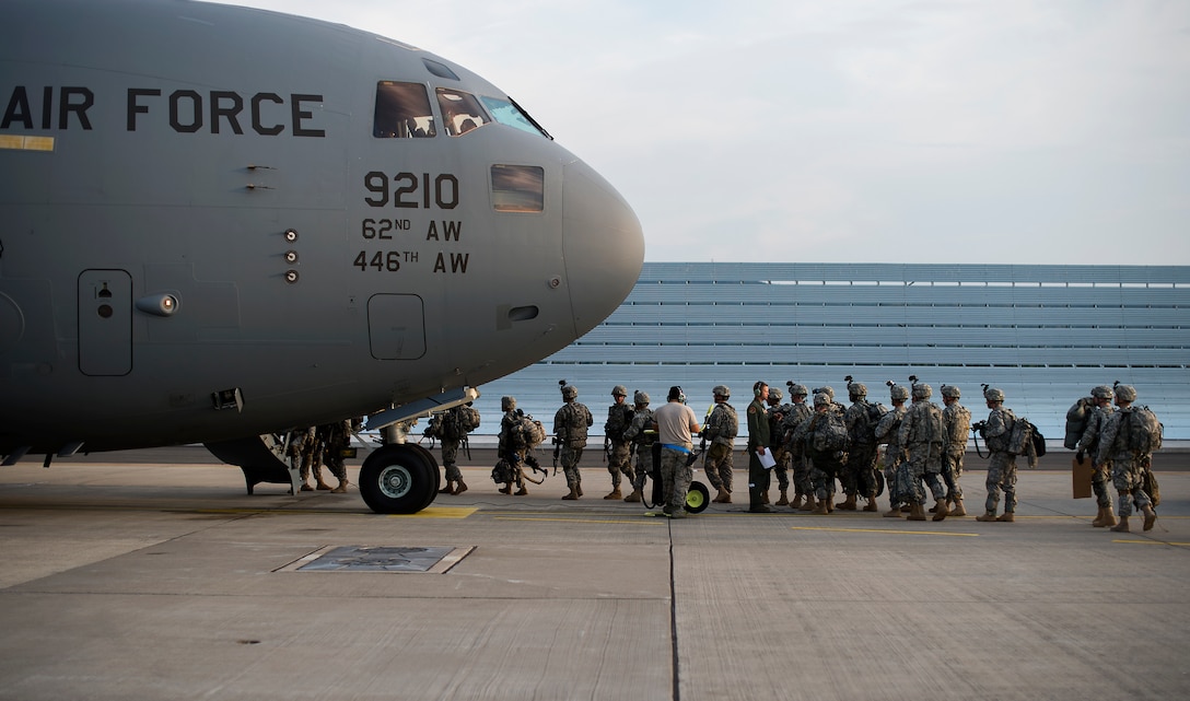 Soldiers assigned to Apache Troop, 1st Squadron, 2nd Cavalry Regiment load into a C-17 Globemaster III in support of Steadfast Javelin II on Ramstein Air Base, Germany, Sept. 5, 2014. Steadfast Javelin II is a NATO exercise involving over 2,000 troops and takes place across Estonia, Germany, Latvia, Lithuania and Poland. (U.S. Air Force photo/Senior Airman Damon Kasberg)
