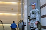 Staff Sgt. Michael Wilson of the New York National Guard patrols at Penn Station in Manhattan, N.Y., on Aug. 25, 2009. Wilson is serving with Joint Task Force Empire Shield, which has been continuously providing military support to civilian authorities since the terrorist attacks of Sept. 11, 2001.