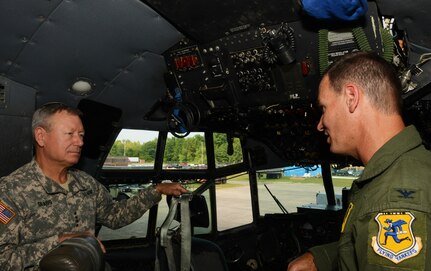 Col. Frank Detorie, commander of the 103rd Airlift Wing, and Gen. Frank J. Grass, Chief of the National Guard Bureau, tour a C-130H Hercules aircraft assigned to the 103rd Airlift Wing, Sept. 6, 2014, at Bradley Air National Guard Base, East Granby, Conn. Grass toured the base and met with Conn. Airmen during a town hall meeting. 