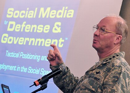 Air Force Gen. Craig R. McKinley, chief of the National Guard Bureau, speaks to civilian and military social media managers on the benefits and risks of using social media within the Defense Department, including the National Guard, at a conference on such Jan. 21 outside the National Capital Region. The National Guard Bureau employs many social media Web sites including Facebook and Twitter to communicate with Citizen-Soldiers and -Airmen as well as the public.