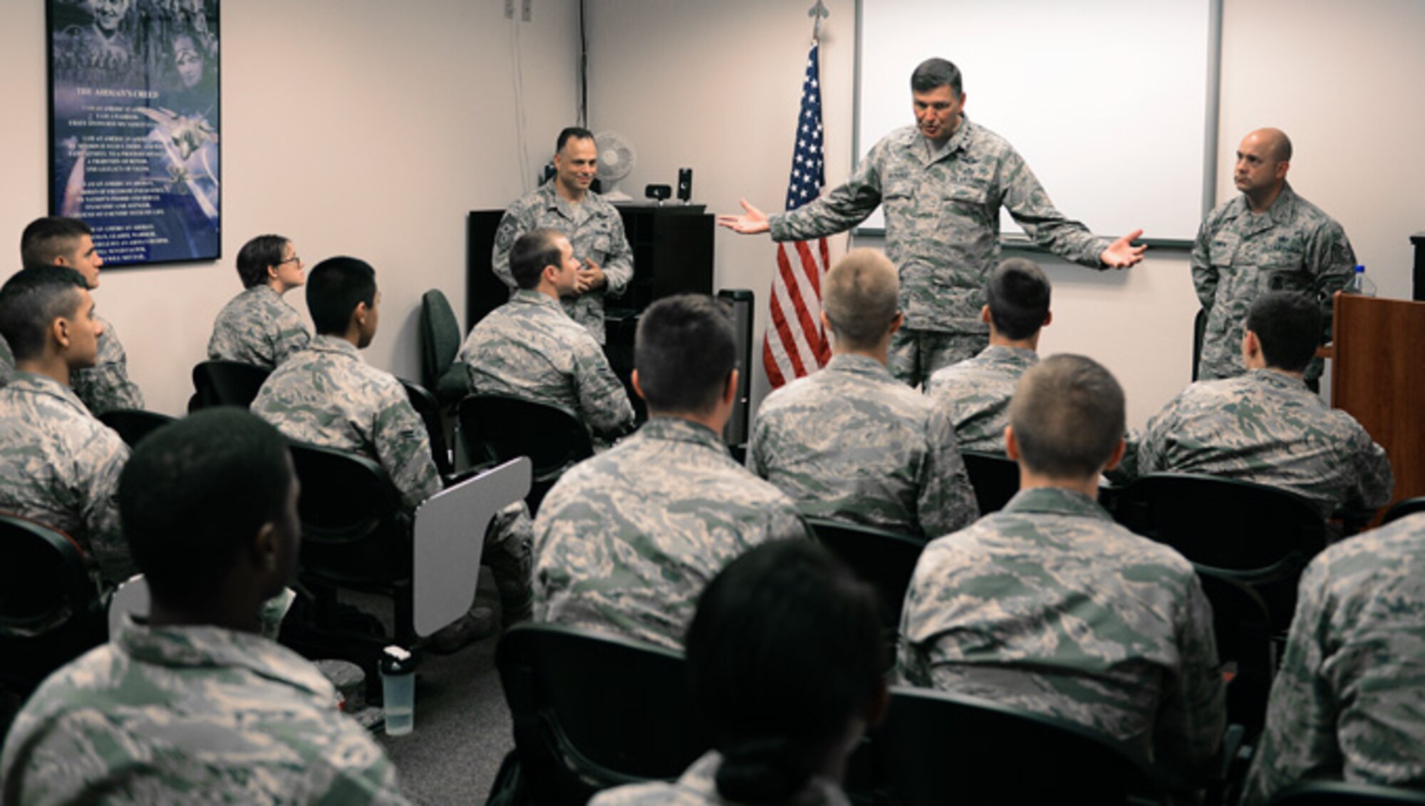 U.S. Air Force Lt. Gen. Brad Heithold, Air Force Special Operations Command commander, speaks to first-term Airmen during a tour Sept. 4, 2014 at Cannon Air Force base, N.M. Heithold connected with Airmen by challenging them to take care of their fellow wingmen and to ensure they devote exceptional service to the Air Force. (U.S. Air Force photo/ Staff Sgt. Matthew Plew) 