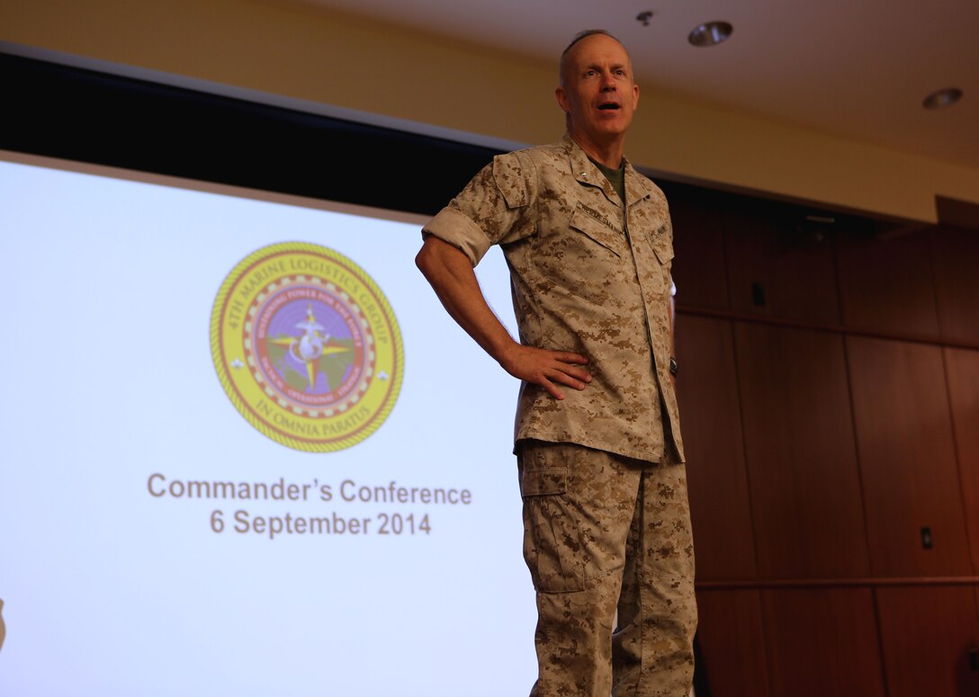 Brig. Gen. Patrick J. Hermesmann, commanding general of 4th Marine Logistics Group, briefs Marines and their spouses during the 4th MLG Commander’s Conference at the Marine Corps Support Facility, New Orleans, Sep. 6-7, 2014.  Hermesmann delivered briefs on how 4th MLG is staying ready, relevant and responsive in order to augment and reinforce the Marine Corps’ active component.  He also focused on the command’s spouses, the importance of their involvement and how it keeps the unit functioning in order to keep the Marines operational.