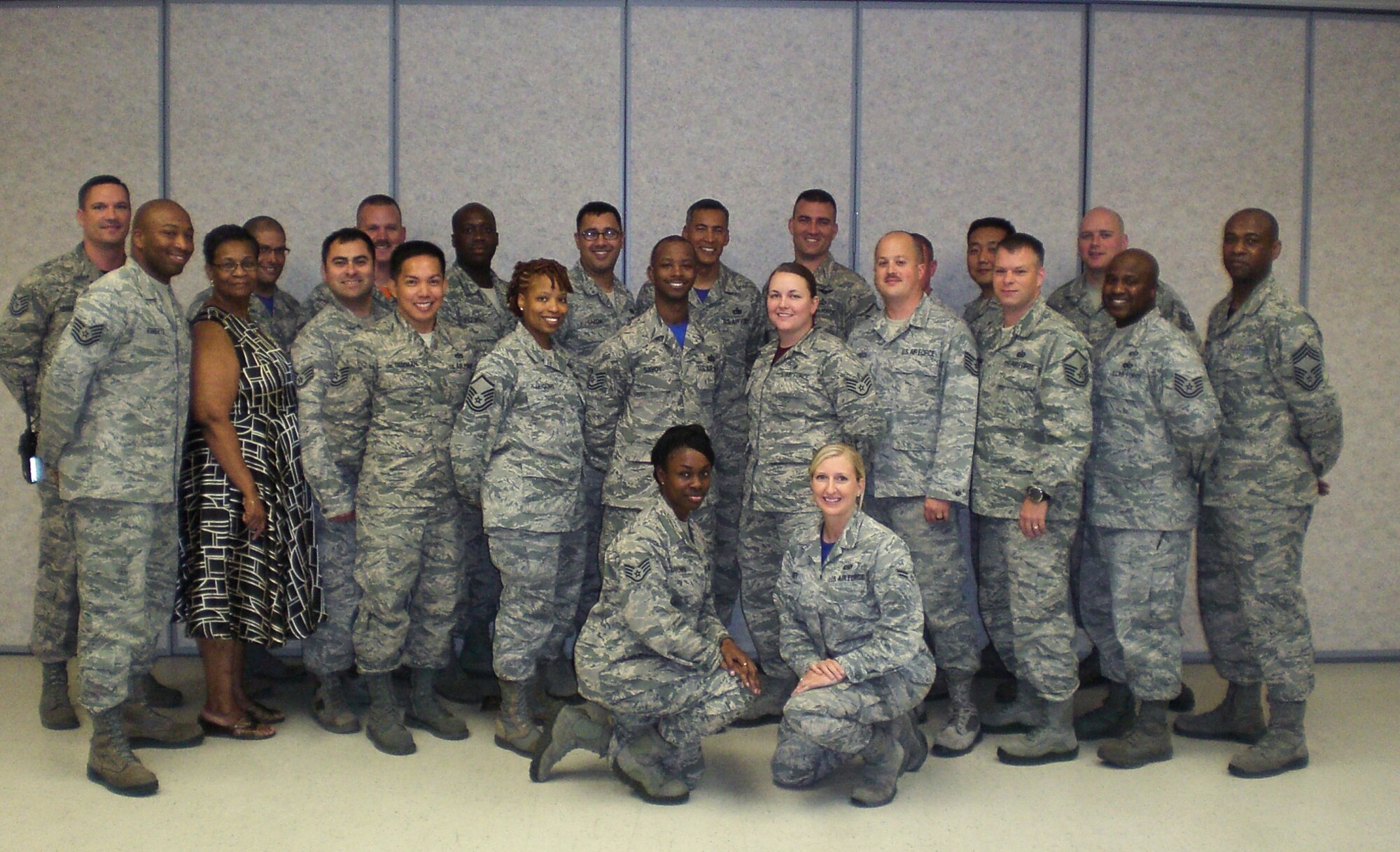Team Osan members pose for a picture after completing the resiliency training assistant course on Osan Air Base, Republic of Korea. The resiliency course teaches military members how to deal with the many issues that they might face in a calm, methodical way; one step at a time. (Courtesy photo)