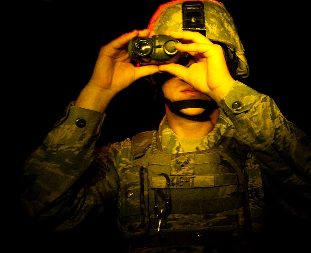 Senior Airman Ethan Kight, 90th Missile Security Forces Squadron, poses with a Thermal-Eye X200xp thermal imager in Building 33, Aug. 27, 2014. Defenders use the thermal imagers during nighttime operations to see in low-light situations. As a result of the Force Improvement Program, an Air Force Global Strike Command program to improve the nuclear deterrence mission, F.E. Warren Air Force Base defenders received funding to purchase more of the thermal imagers. (U.S. Air Force photo by Senior Airman Jason Wiese)