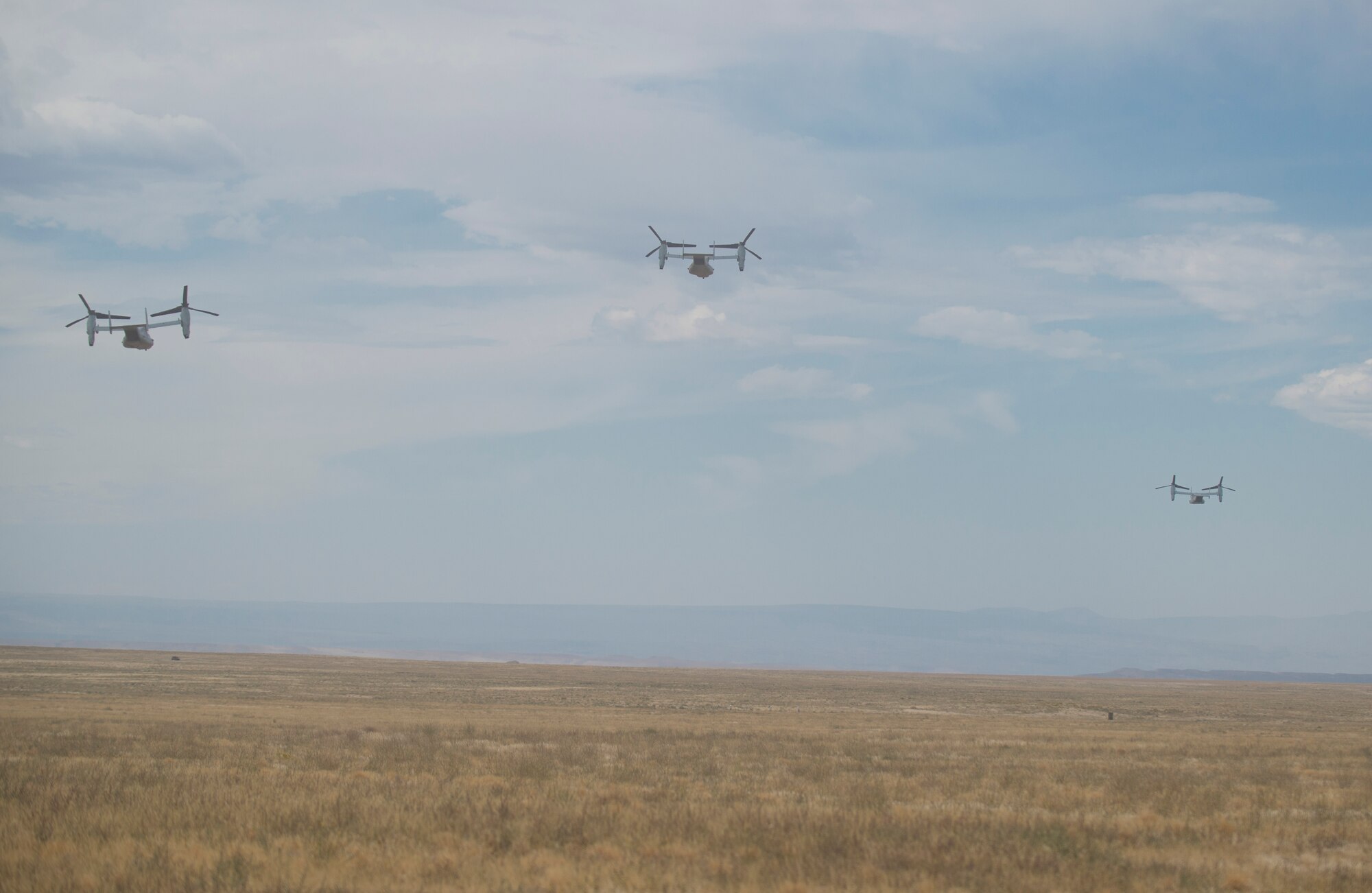 Multiple MV-22B Ospreys take off from Saylor Creek Range Complex, near Mountain Home Air Force Base, Idaho, Sept. 8, 2014. The Ospreys are from Miramar, Calif., conducting multiple operations throughout the day as part of combat training. (U.S. Air Force Photo by Airman 1st Class Brittany A. Chase/Released)