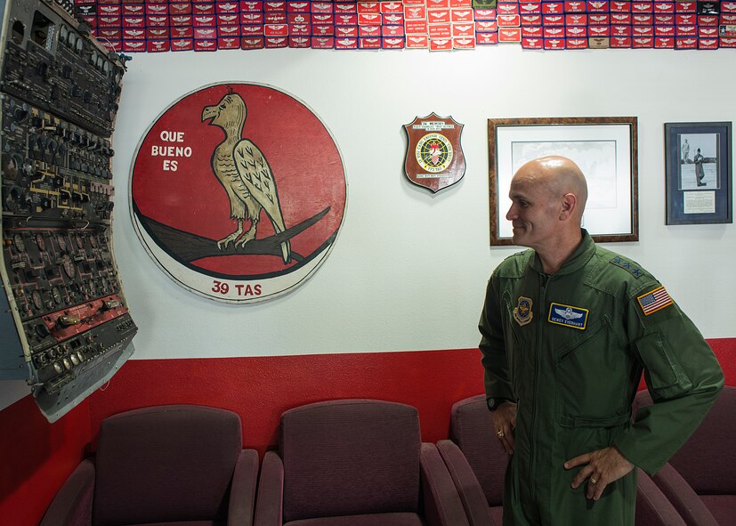 U.S. Air Force Lt. Gen. Carlton D. Everhart II, 18th Air Force commander, looks at equipment from a C-130E Aug. 27, 2014, at Dyess Air Force Base, Texas. Throughout his visit, Lt. Gen. Everhart was often informed of the 317th AG’s roots, which stretch back to World War II. (U.S. Air Force photo by Senior Airman Peter Thompson/Released)