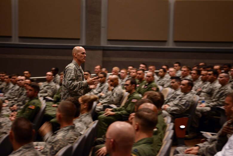 U.S. Air Force Lt. Gen. Carlton D. Everhart II, 18th Air Force commander, speaks to Airmen from the 317th Airlift Group during an all call Aug. 26, 2014, at Dyess Air Force Base, Texas. The 317th AG, assigned to Air Mobility Command Eighteenth Air Force, is home to two combat airlift squadrons currently providing support to Overseas Contingency Operations. (U.S. Air Force photo by Senior Airman Peter Thompson/Released)
