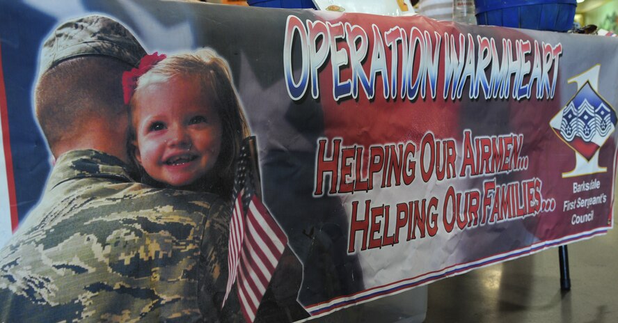 Operation Warm-Heart program is dedicated to raising money to benefit the Barksdale Airmen and their families during the holidays and throughout the year. The first sergeants use the donations to provide Airmen in need with commissary gift cards for holiday meals and support the Random Acts of Kindness program. (U.S. Air Force photo/Senior Airman Jannelle Dickey)