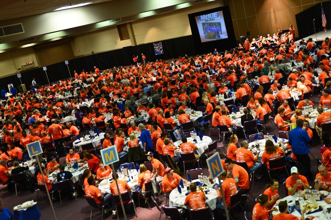 Approximately 480 Ellsworth volunteers were among the more than 1,100 people who attended the United Way Day of Caring kickoff luncheon in Rapid City, S.D., Sept. 4, 2014. Once a year, volunteers from across the Black Hills unite to complete community projects throughout the day, giving back to their communities and helping those less fortunate. (U.S. Air Force photo by Senior Airman Zachary Hada/Released)