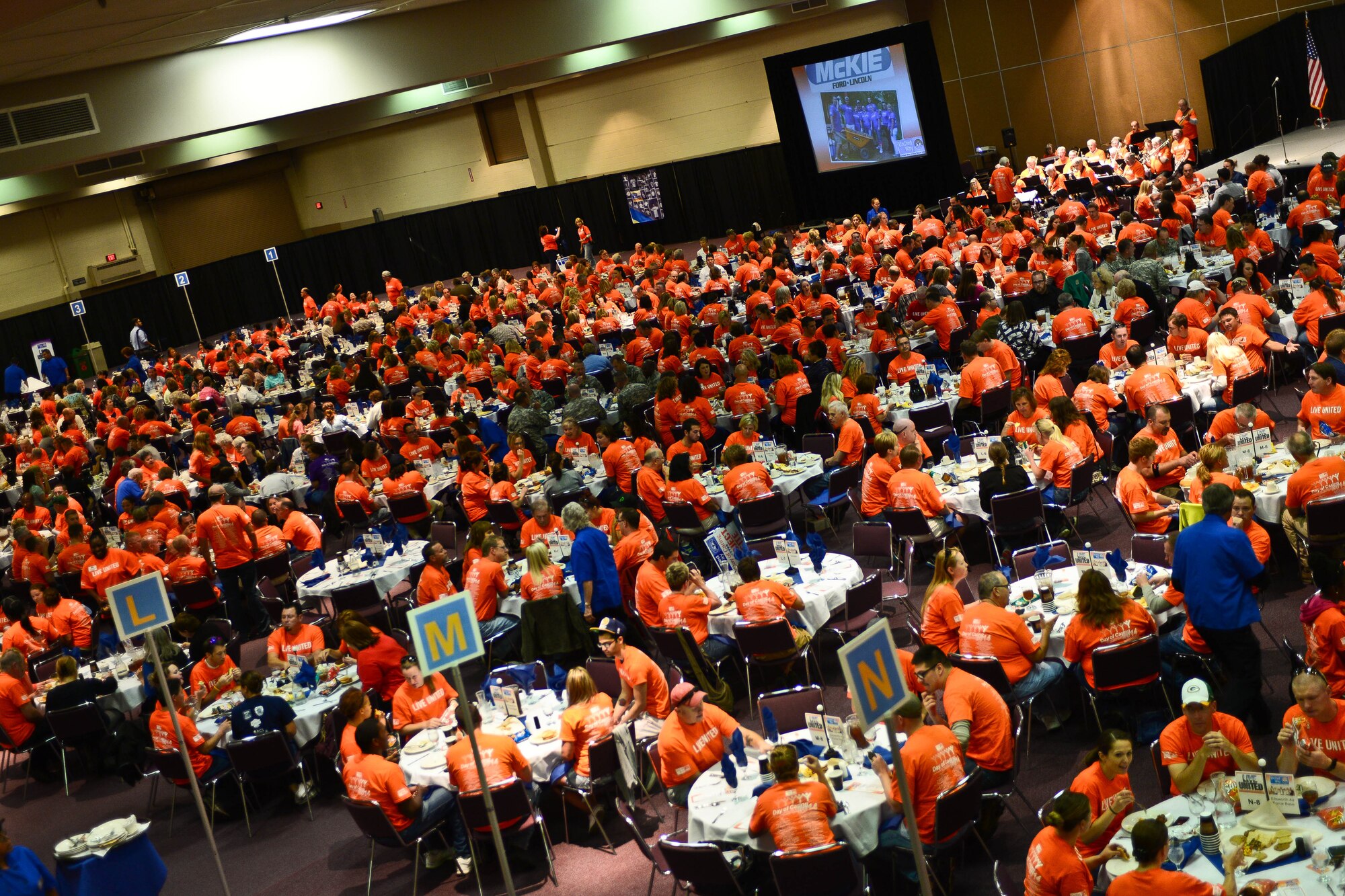 Approximately 480 Ellsworth volunteers were among the more than 1,100 people who attended the United Way Day of Caring kickoff luncheon in Rapid City, S.D., Sept. 4, 2014. Once a year, volunteers from across the Black Hills unite to complete community projects throughout the day, giving back to their communities and helping those less fortunate. (U.S. Air Force photo by Senior Airman Zachary Hada/Released)