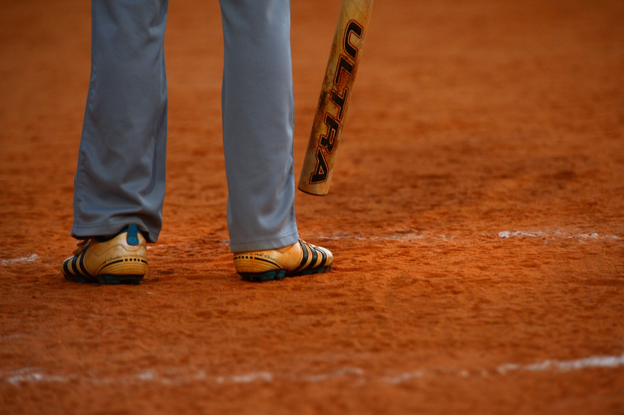 A 20th Aircraft Maintenance Squadron Airman stands in the on-deck circle during the intramural softball championship game at Shaw Air Force Base, S.C., Sept. 2, 2014. The 20th AMXS was defeated by the 20th Civil Engineer Squadron Fire Department with a final score of 5-4. (U.S. Air Force photo by Airman 1st Class Jensen Stidham/Released)