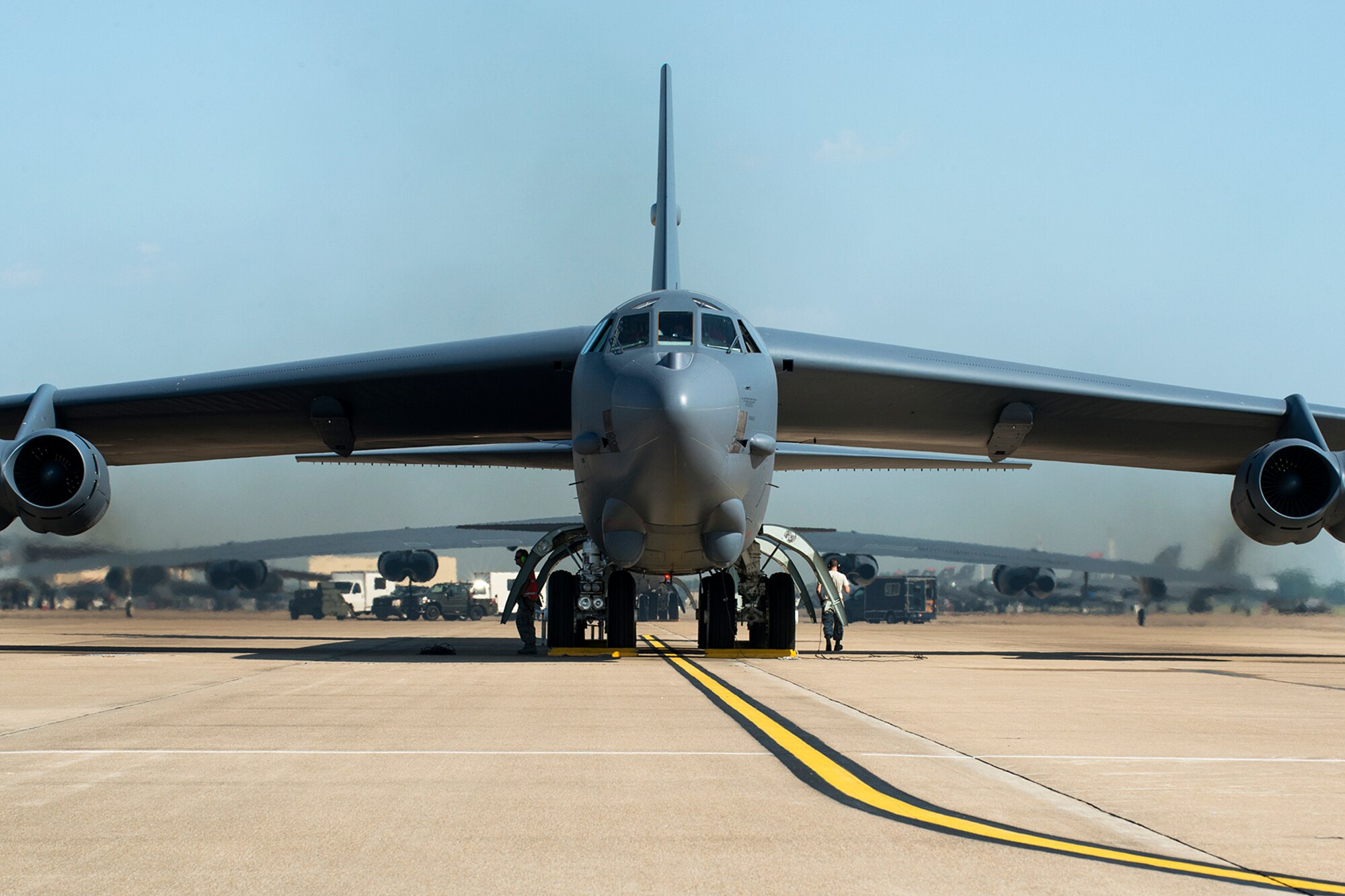 A 307th Bomb Wing B-52H Stratofortress runs up its engines prior to leaving for a mission on Aug. 28, 2014, Barksdale Air Force Base, La. On board the aircraft is Col. William Lyons, Assistant Vice Commander and the Director of Staff for 10th Air Force, who visited the 307th BW and flew his first flight in a B-52. (U.S. Air Force photo by Master Sgt. Greg Steele/Released)
