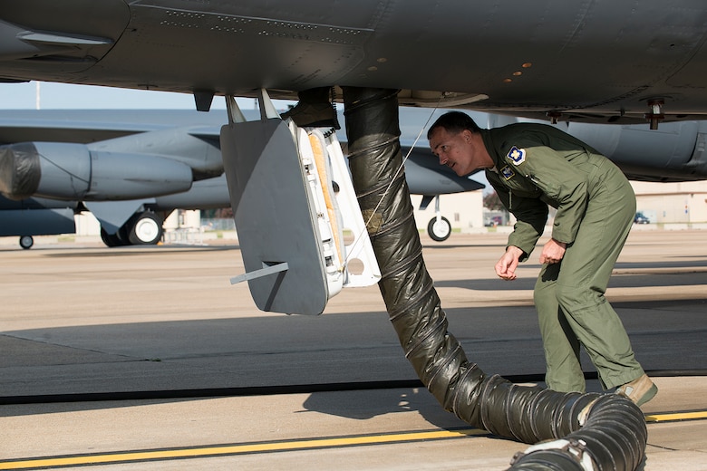 U.S. Air Force Col. William Lyons prepares to climb up into the cockpit of a 307th Bomb Wing B-52H Stratofortress prior to a flight on Aug. 28, 2014, Barksdale Air Force Base, La. Lyons is the Assistant Vice Commander and the Director of Staff, 10th Air Force, Naval Air Station Fort Worth Joint Reserve Base, Texas. (U.S. Air Force photo by Master Sgt. Greg Steele/Released)