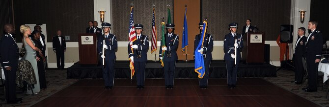 The Fairchild Honor Guard posts the colors during the Air Force Ball at the Red Lion Hotel in Spokane, Washington, Sept. 6, 2014. The ball was held to celebrate the 67th anniversary of the Air Force and 72nd anniversary of the 92nd Bomb Group. (U.S. Air Force photo by Staff Sgt. Samantha Krolikowski/Released)