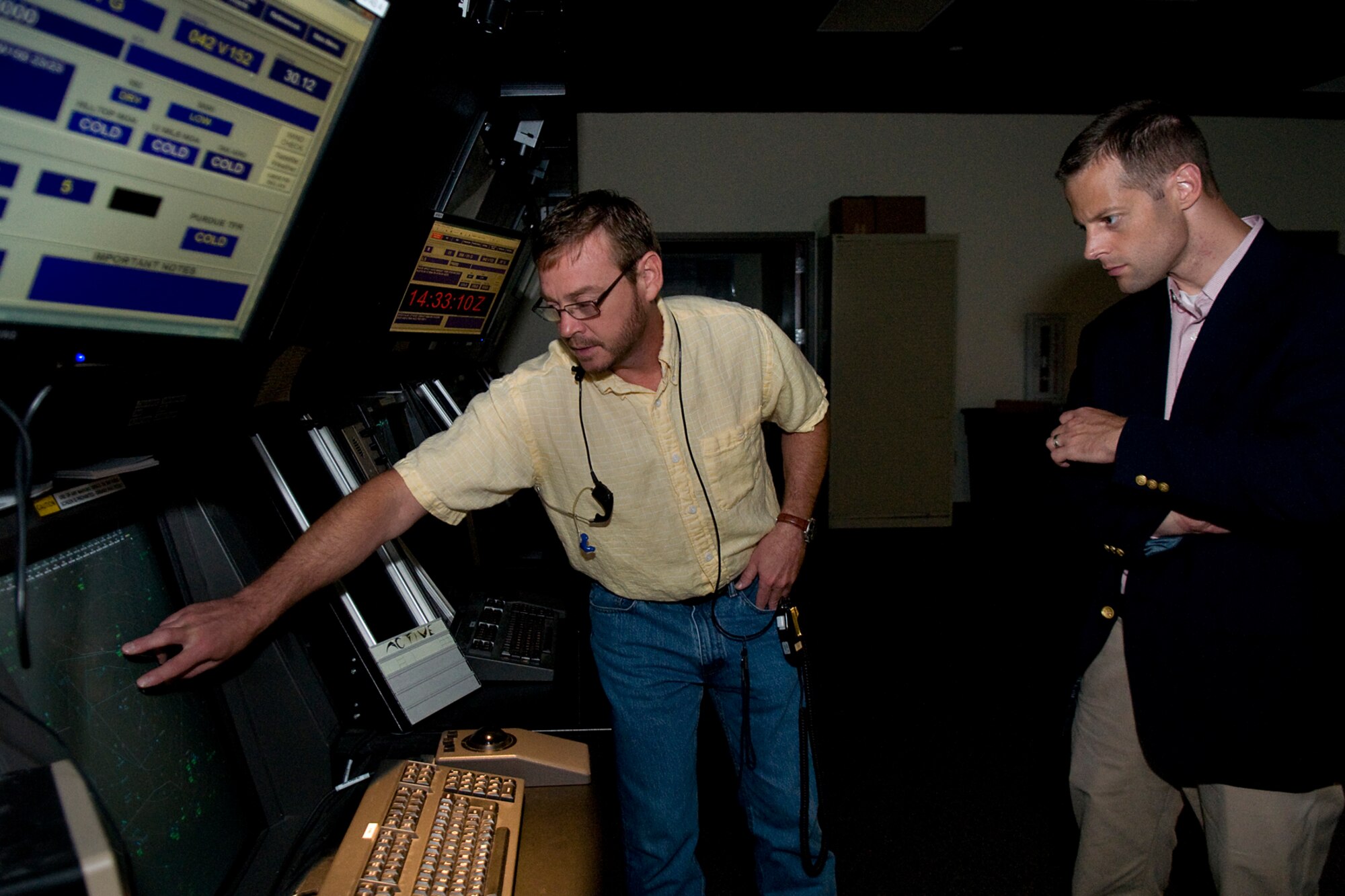 Kevin Ware, 434th Operations Support Squadron air traffic controller, shows Sam Fletcher, military legislative assistant for Rep. Jackie Walorski, the air space he controls at Grissom Air Reserve Base, Ind., Aug. 27, 2014. Grissom controls all military, civilian and commercial air traffic between Chicago Center and Indianapolis Center, going as far west as Lafayette, Ind., up to 10,000 feet. (U.S. Air Force photo/Tech. Sgt. Mark R. W. Orders-Woempner) 
