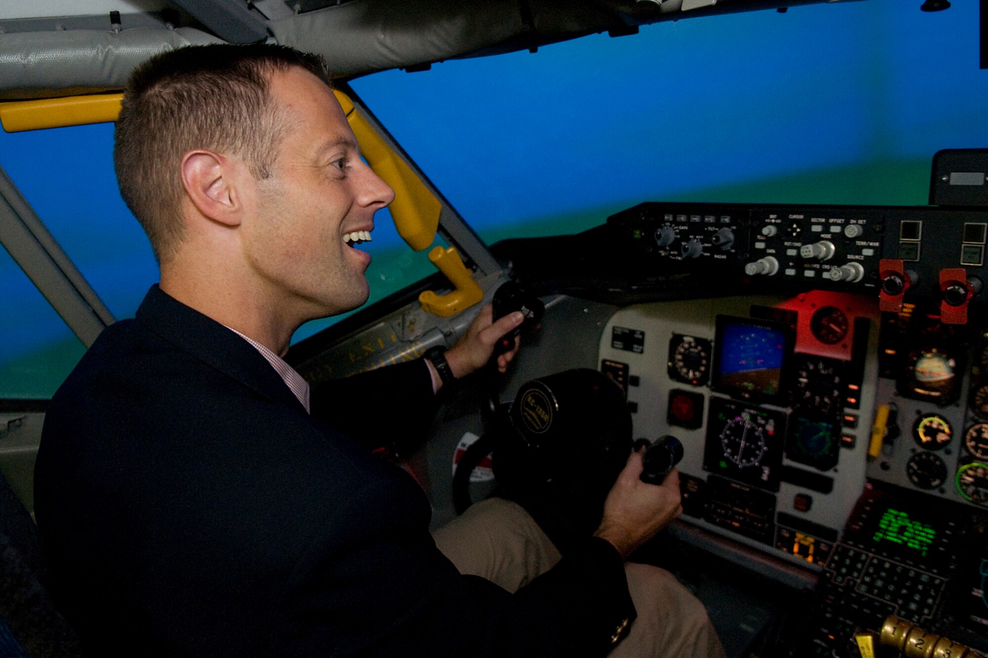Sam Fletcher, military legislative assistant for Rep. Jackie Walorski, flies a KC-135R Stratotanker simulator at Grissom Air Reserve Base, Ind., Aug. 27, 2014. Fletcher, a former U.S. Navy F-18 Hornet pilot, visited the base to learn more about the 434th Air Refueling Wing and its mission. (U.S. Air Force photo/Tech. Sgt. Mark R. W. Orders-Woempner) 
