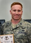 Capt. Travis Ralph, 2nd Special Operations Squadron, was selected as the company grade officer of the 3rd Quarter for the 919th Special Operations Wing recently at Duke Field, Fla.  (U.S. Air Force photo/Tech. Sgt. Cheryl Foster)