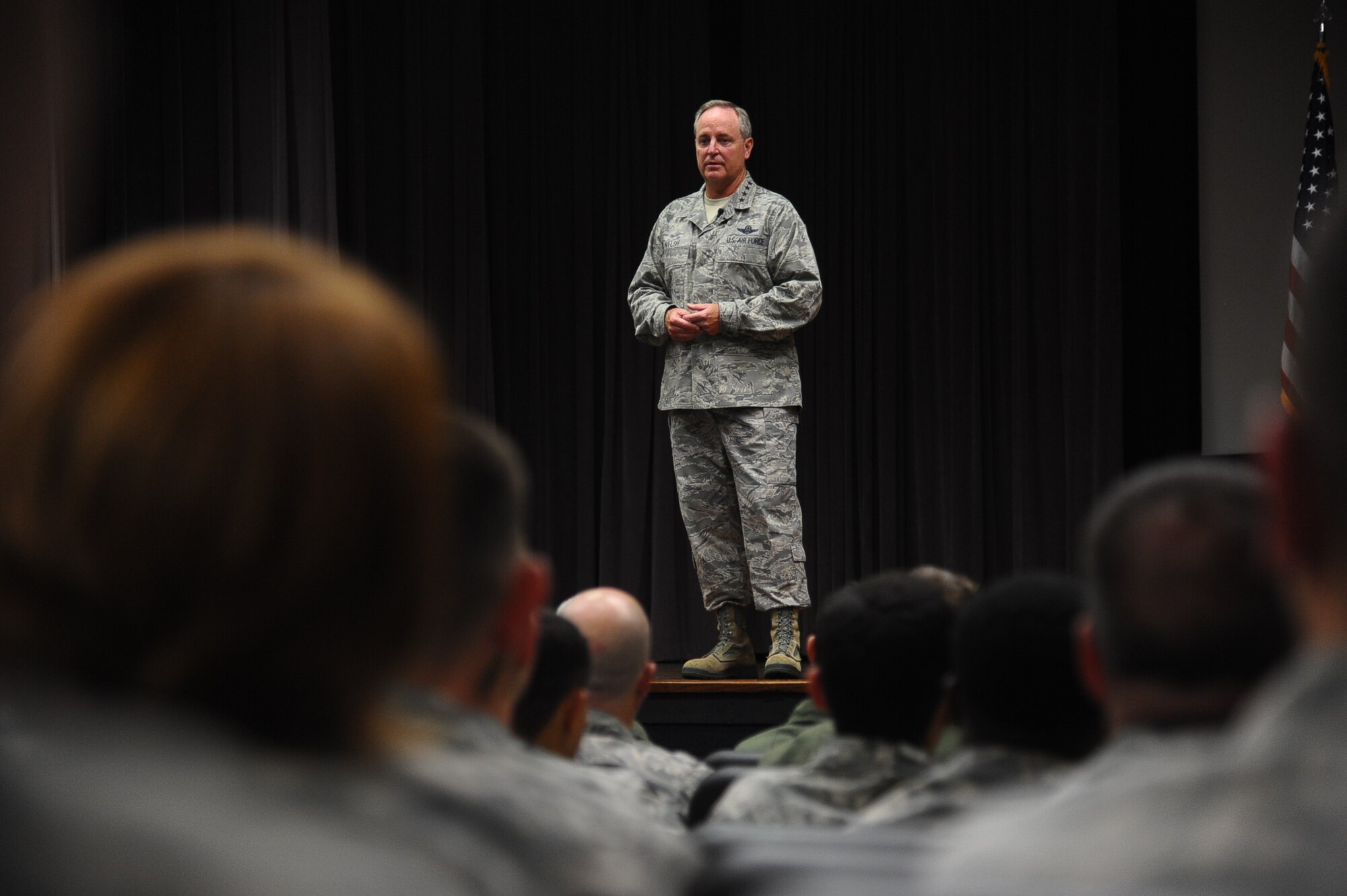 Gen. Mark A. Welsh III, Chief of Staff of the Air Force, addresses Columbus Air Force Base Airmen at a wing All Call  Sept. 5 during Welsh's visit to the base. The visit was prompted by an invitation from Specialized Undergraduate Pilot Training Class 14-14 to be the keynote speaker at their graduation. Welsh also took the time to address and answer questions from the Airmen of Columbus AFB. (U.S. Air Force Photo/Airman 1st Class Daniel Lile)