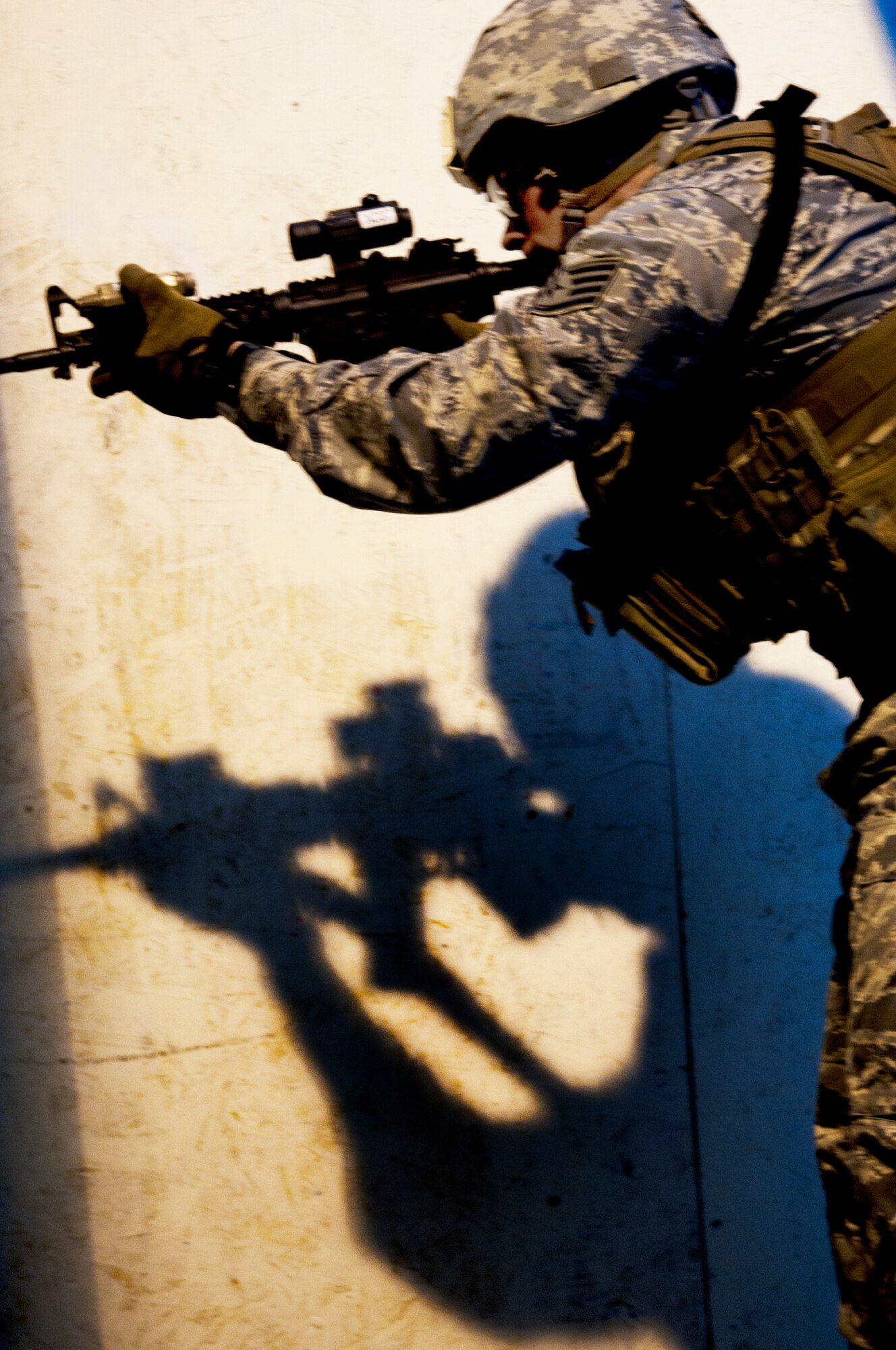 Staff Sgt. Ryan Fontaine, 219th Security Forces Squadron member, fires an M4 rifle during training on Minot Air Force Base, N.D., Sept 3, 2014. Fontaine is a member of the 91st Security Forces Group Global Strike Challenge team.   (U.S. Air Force photo/Senior Airman Brittany Y. Bateman)
