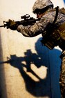 Staff Sgt. Ryan Fontaine, 219th Security Forces Squadron member, fires an M4 rifle during training on Minot Air Force Base, N.D., Sept 3, 2014. Fontaine is a member of the 91st Security Forces Group Global Strike Challenge team.   (U.S. Air Force photo/Senior Airman Brittany Y. Bateman)