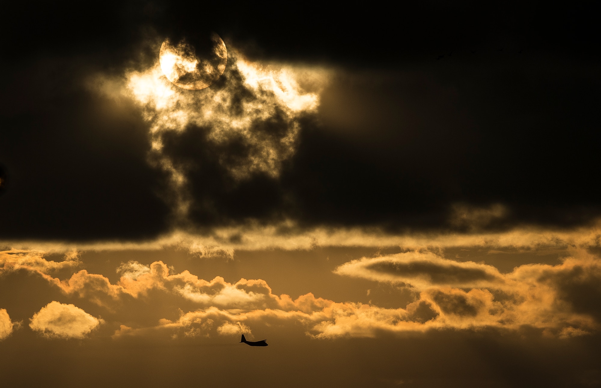 An Air Force Reserve aircrew flying a C-130 Hercules assigned to the 910th Airlift Wing, Youngstown Air Reserve Station, Ohio, performs aerial spraying for mosquitos Sept. 6, 2014, over Joint Base Charleston – Weapons Station, S.C. The insecticide the unit uses is mixed with water to dilute the product to exact specifications to cause no harm to insects or wildlife other than mosquitos. (U.S. Air Force photo/Senior Airman Dennis Sloan)