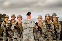 Members of the 91st Security Forces Group Global Strike Challenge team pose for a photo on Minot Air Force Base, N.D., Sept. 4, 2014. In conjunction with the Air National Guard, Minot Air Force Base is sending a joint team of defenders to represent the missile wing. (U.S. Air Force photo/Senior Airman Brittany Y. Bateman)