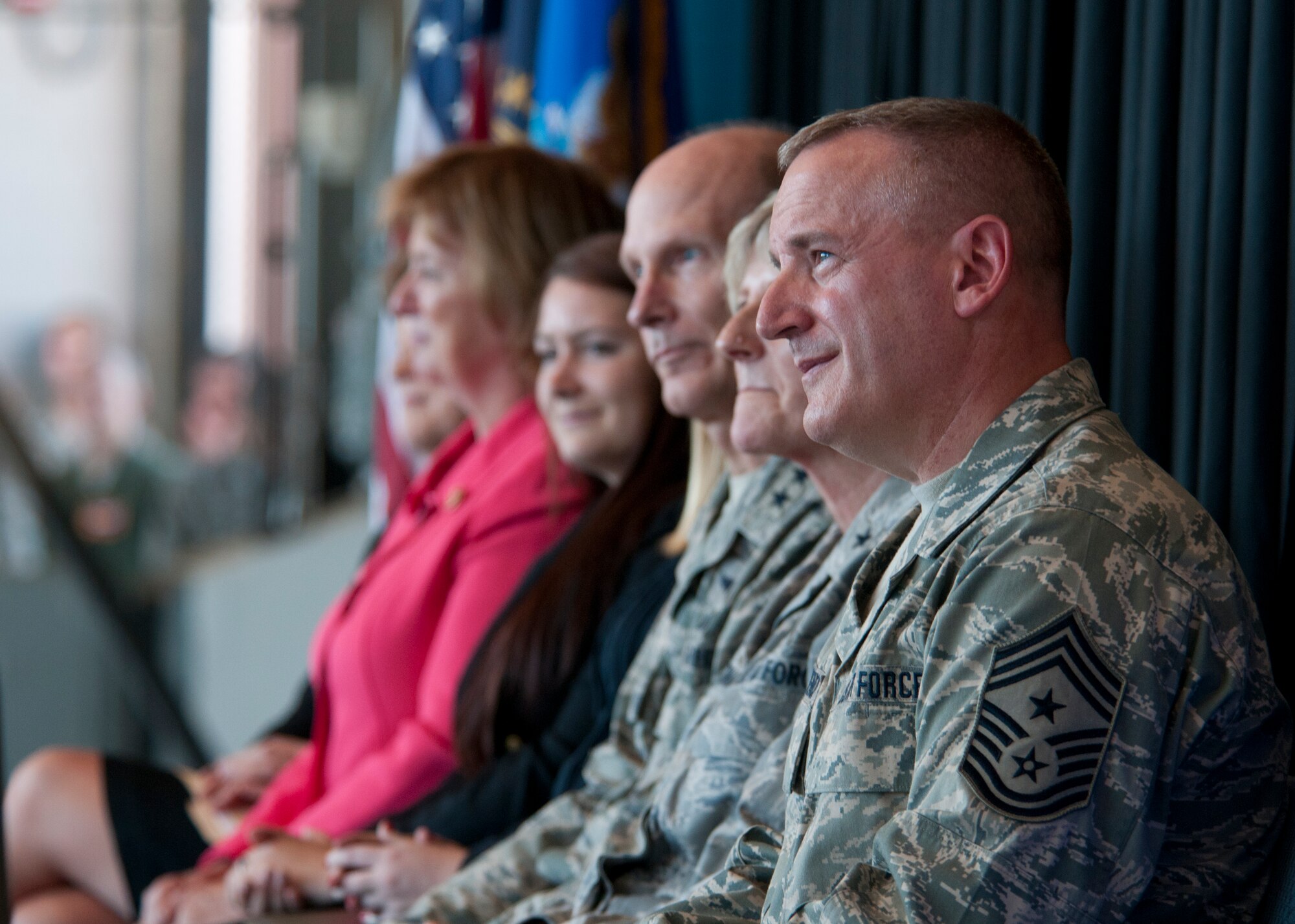 157 Air Refueling Wing Command Chief Master Sergeant Jamie Lawrence sits alongside wing senior staff and members of New Hampshire’s congressional delegation during the KC-46 selection celebration, Pease Air National Guard Base, N.H. Sept. 7, 2014.  (U.S. Air National Guard photo by Staff Sgt. Curtis J. Lenz) 