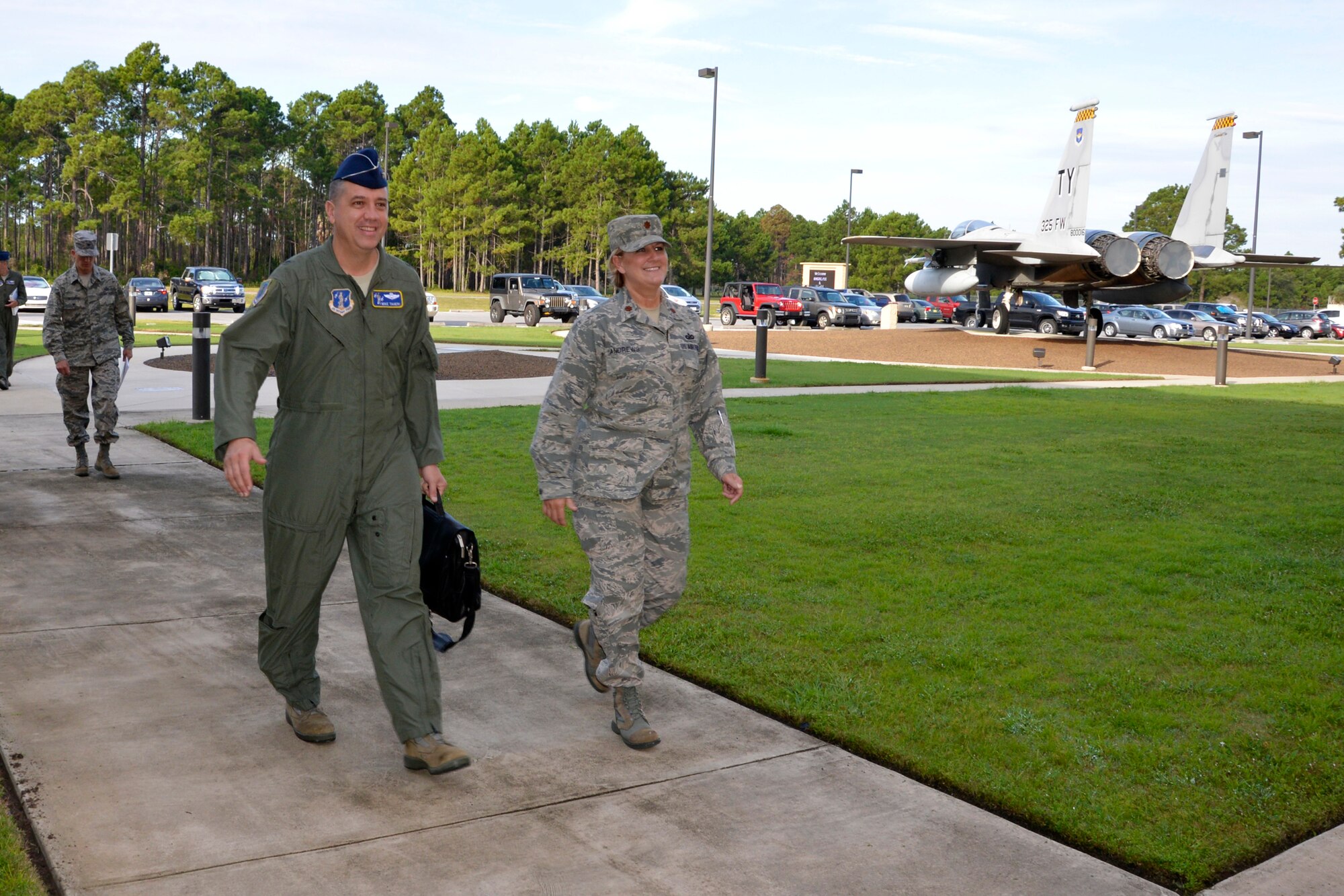 9/3/2014 – TYNDALL AIR FORCE BASE, Fla. – Brig. Gen. Michael Taheri, left, Air National Guard Readiness Center (ANGRC) commander, Joint Base Andrews, Maryland, arrives at the Killey Center for Homeland Operations Sept 3. Maj. Katrina Andrews, right, chief of protocol, Air Forces Northern, escorts Taheri and senior members of the ANGRC staff, to attend a two-day visit hosted by Lt. Gen. William Etter, commander, Continental U.S. North American Aerospace Defense Command Region - 1st Air Force, AFNORTH. (U.S. Photo by Master Sgt. Kurt Skoglund/Released)