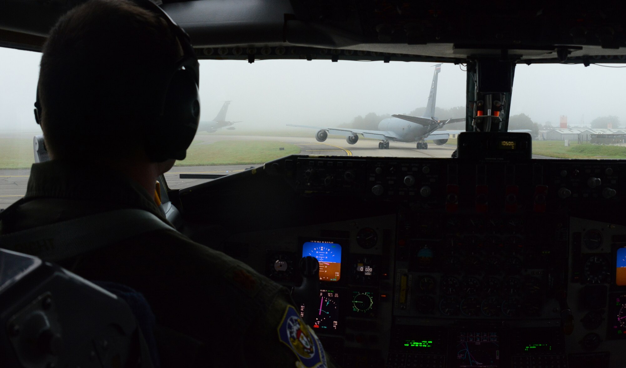 U.S. Air Force Maj. Steve Strasbaugh, 351st Air Refueling Squadron instructor pilot from Watonga, Okla., taxis behind a KC-135 Stratotanker during a four-ship training sortie Sept. 5, 2014, from RAF Mildenhall, England. The four aircraft departed RAF Mildenhall to support Royal Norwegian Air Force F-16 Fighting Falcons during a training mission. The 351st ARS trains consistently with its NATO allies to ensure mission success between partner nations. (U.S. Air Force photo/Senior Airman Micaiah Anthony/Released)
