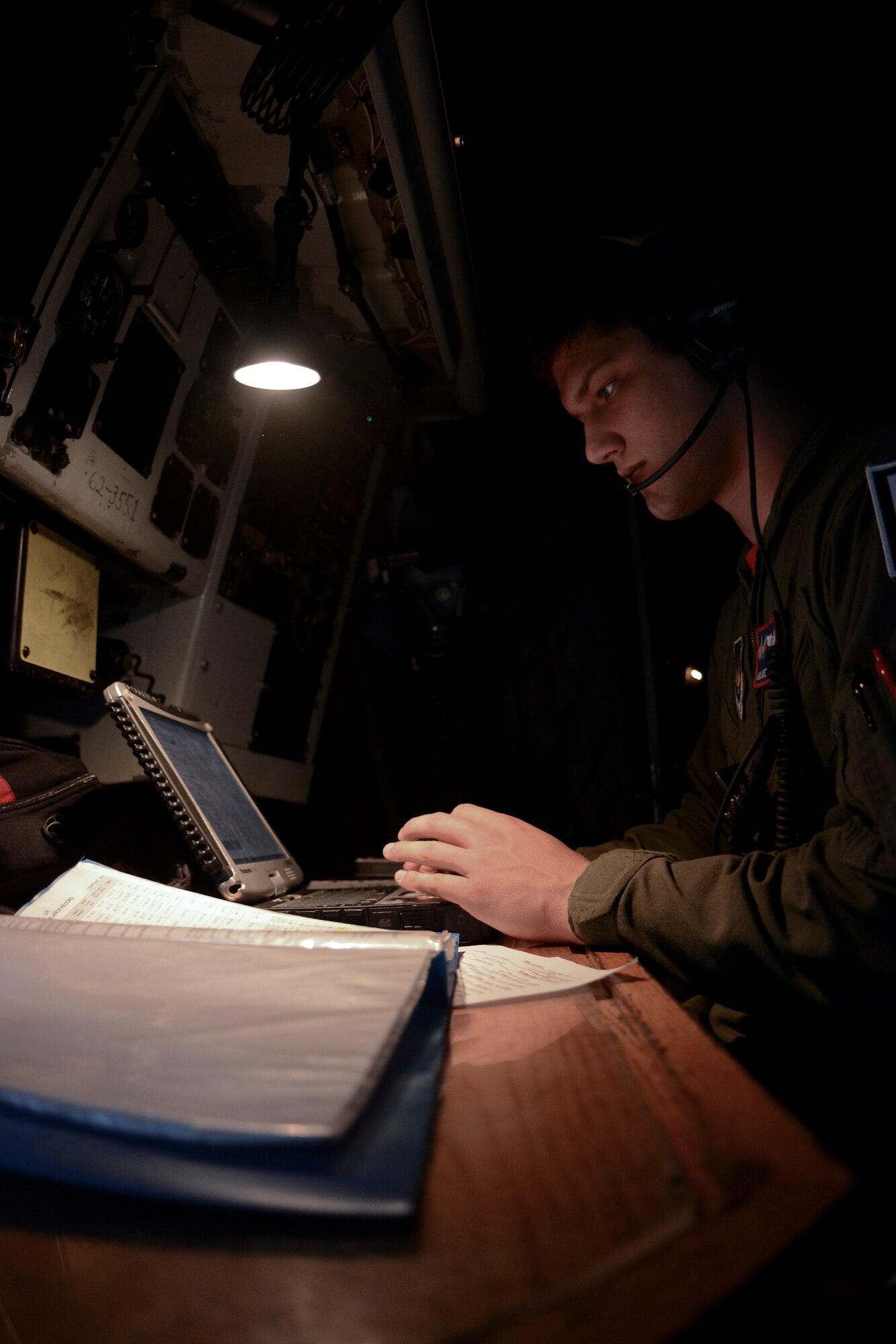 U.S. Air Force Airman Warren Shumaker, 351st Air Refueling Squadron boom operator from Harrisburg, S.D., goes through a preflight checklist Sept. 5, 2014, on RAF Mildenhall, England. Shumaker works with the pilot and copilot to complete pre-flight and in-flight checklists essential for a safe and successful flight. (U.S. Air Force photo/Senior Airman Micaiah Anthony/Released)