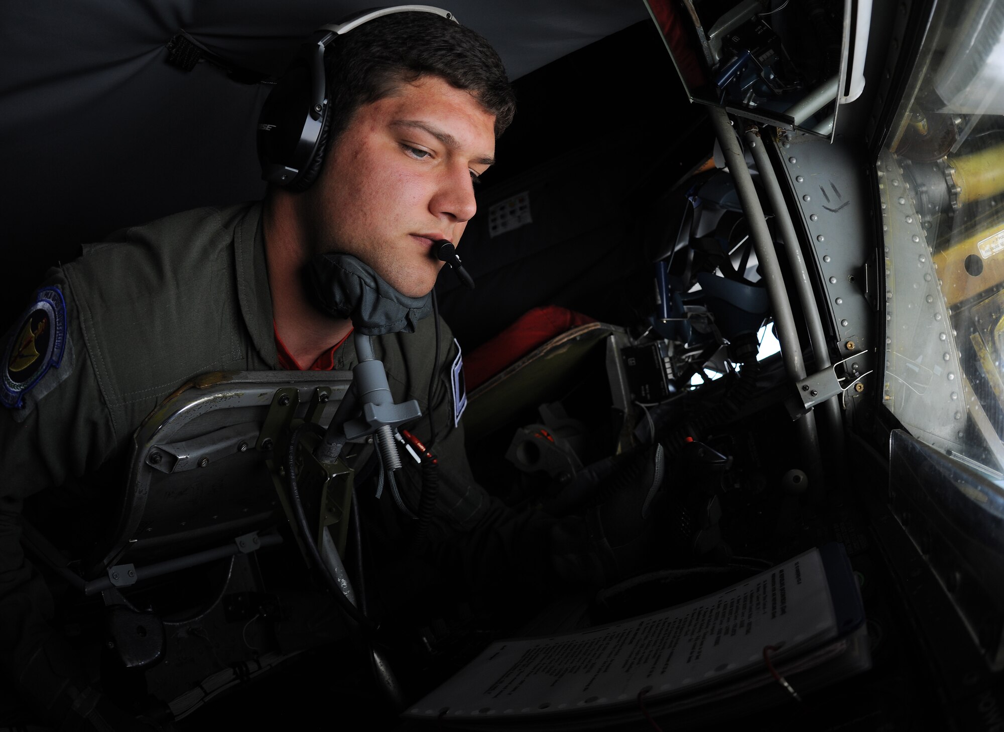 U.S. Air Force Airman Warren Shumaker, 351st Air Refueling Squadron boom operator from Harrisburg, S.D, refuels a Royal Norwegian Air Force F-16 Fighting Falcon Sept. 5, 2014, over Norway. As a boom operator, Shumaker is responsible for guiding the boom and refueling receiving aircraft. (U.S. Air Force photo/Senior Airman Micaiah Anthony/Released)