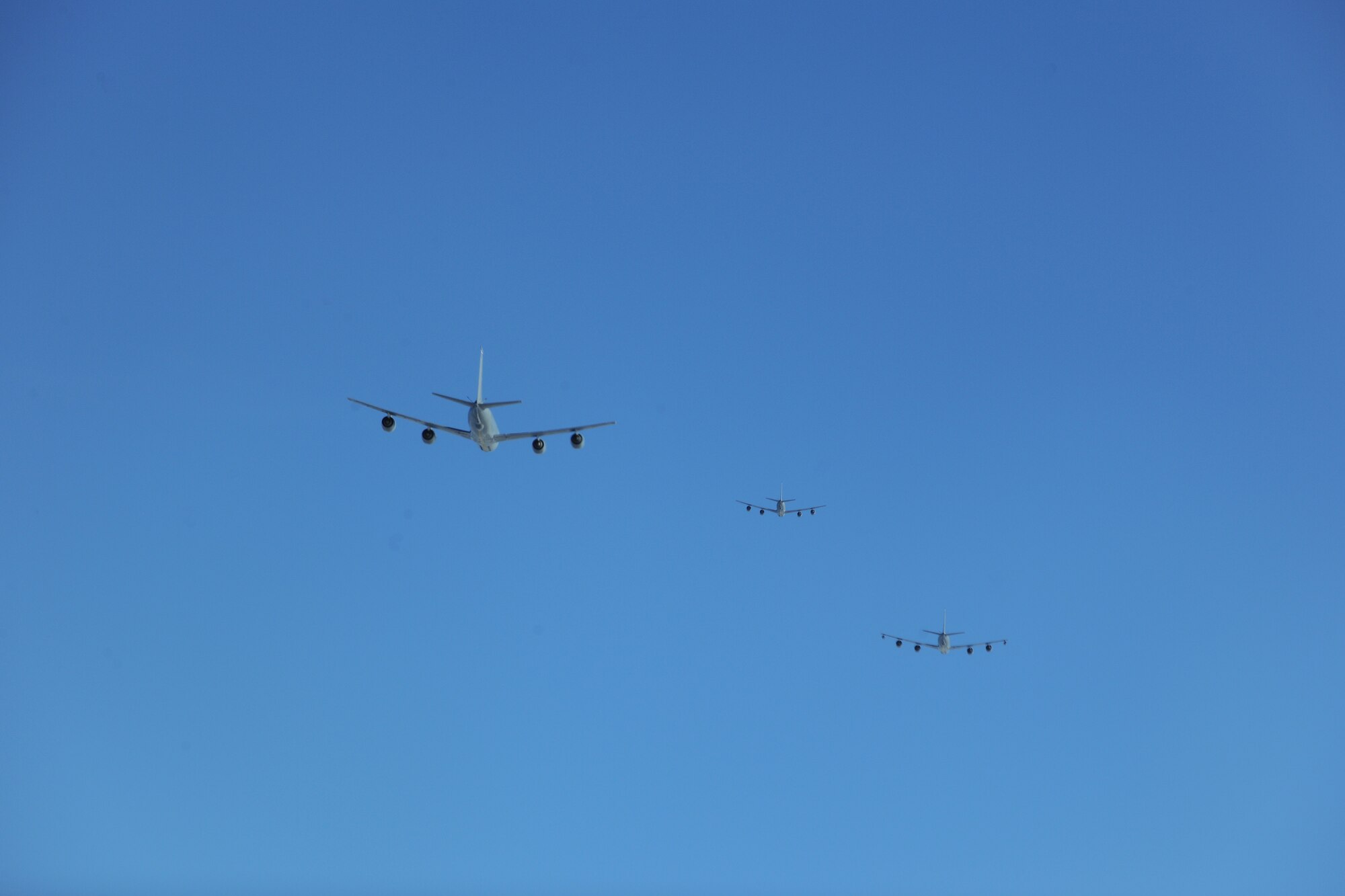 Three KC-135 Stratotankers assigned to RAF Mildenhall, England, fly in formation during a four-ship training sortie Sept. 5, 2014, over Norway. Four-ship sorties enable tankers to provide concentrated aerial refueling support for large forces during major operations. (U.S. Air Force photo/Senior Airman Micaiah Anthony/Released)  