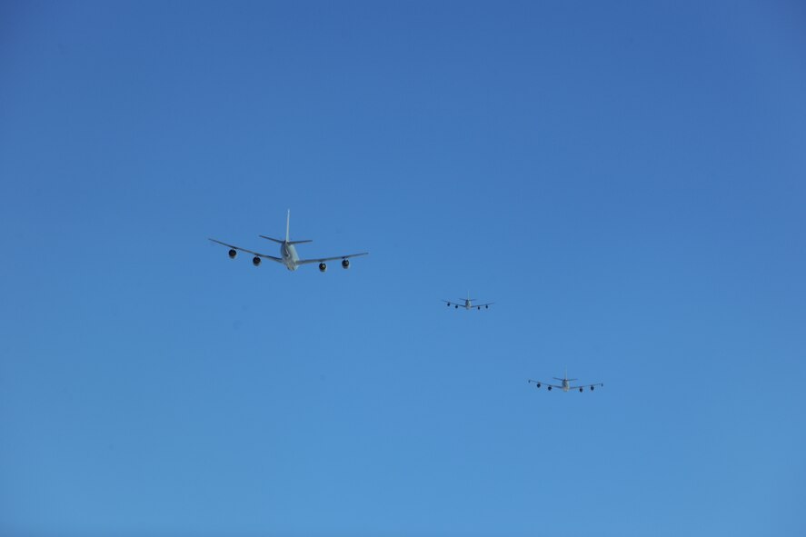 Three KC-135 Stratotankers assigned to RAF Mildenhall, England, fly in formation during a four-ship training sortie Sept. 5, 2014, over Norway. Four-ship sorties enable tankers to provide concentrated aerial refueling support for large forces during major operations. (U.S. Air Force photo/Senior Airman Micaiah Anthony/Released)  