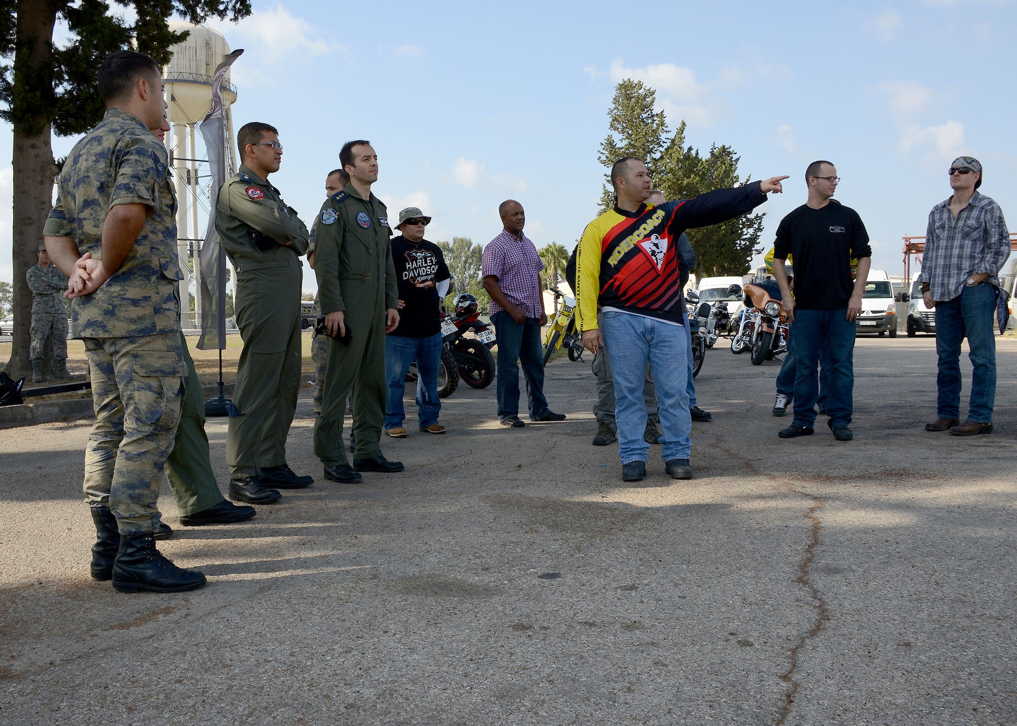 Master Sgt. Jamie Gallegos, 39th Communications Squadron cyber transport systems section chief, reviews an obstacle path set up for a motorcycle safety course Sept. 5, 2014, Incirlik Air Base, Turkey. The demonstration was a joint course made up of members from the 39th Air Base Wing and Turkish Airmen from the 10th Tanker Base. The demonstration was a chance for motorcycle riders from both Air Forces to learn from one another and build a robust motorcycle safety course. (U.S. Air Force photo by Staff Sgt. Veronica Pierce/Released) 