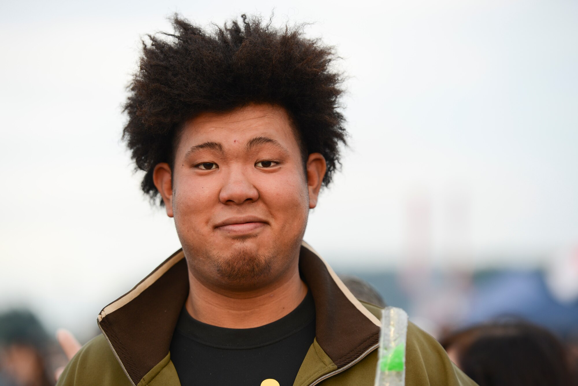 A man poses for a picture during the 2014 Japanese-American Friendship Festival at Yokota Air Base, Japan, Sept. 7, 2014. More than 148,000 people attended this year’s festival which allowed Japanese citizens and people from other nations to enjoy each other’s culture and learn about U.S. and Japanese military aircraft and operations. (U.S. Air Force photo by Staff Sgt. Cody H. Ramirez/Released)