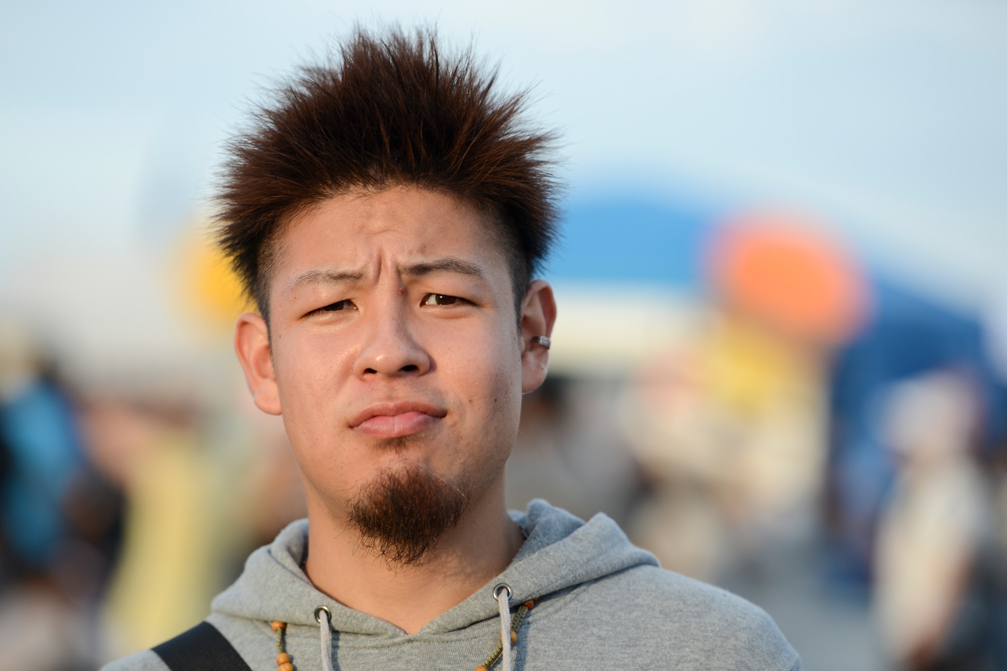 A man poses for a picture during the 2014 Japanese-American Friendship Festival at Yokota Air Base, Japan, Sept. 7, 2014. More than 148,000 people attended this year’s festival which allowed Japanese citizens and people from other nations to enjoy each other’s culture and learn about U.S. and Japanese military aircraft and operations. (U.S. Air Force photo by Staff Sgt. Cody H. Ramirez/Released)