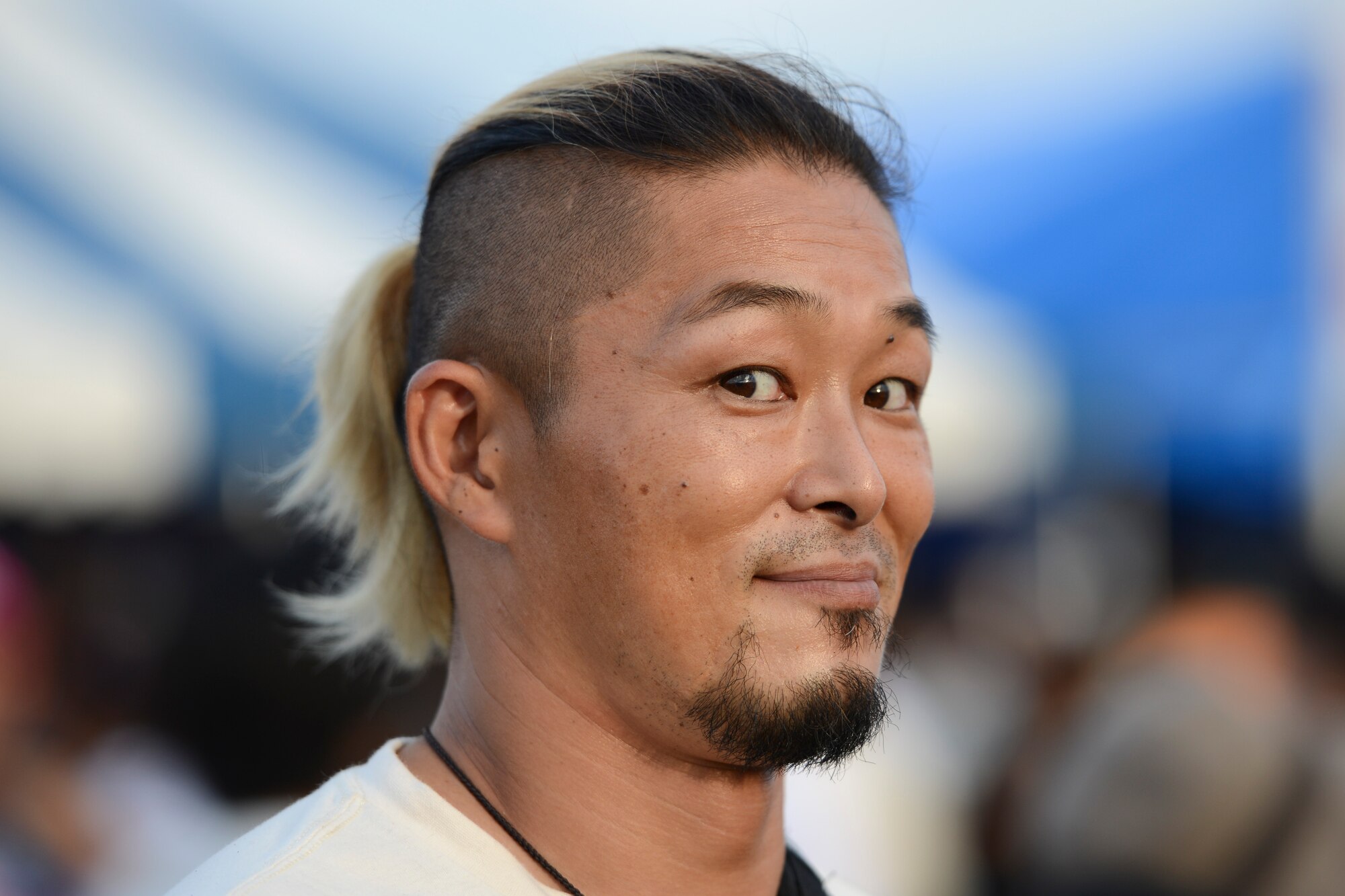 A festival goer poses for a picture during the 2014 Japanese-American Friendship Festival at Yokota Air Base, Japan, Sept. 7, 2014. More than 148,000 people attended this year’s festival. (U.S. Air Force photo by Staff Sgt. Cody H. Ramirez/Released)