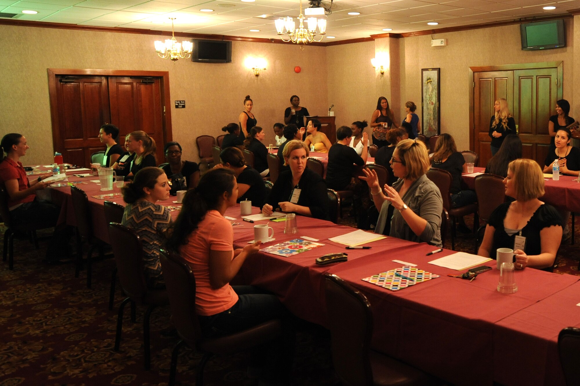 Kadena hosts a Female Airmen Mentee Experience on Kadena Air Base, Japan, Sept. 4, 2014. FAME, modeled after speed dating, was for female staff sergeants and below to speak with female technical sergeants and above to help them find a suitable mentor. The airmen had three minutes to talk with each mentor before getting their information and moving on to the next mentor. (U.S. Air Force photo by Stephen G. Eigel/Released)