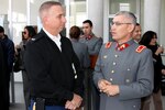 Col. Lee Schnell, left, discusses observations made during the Volcano VI emergency exercise with Chilean Army Brig. Gen. Miguel Alfonso Bellet, commander of the 1st Brigade "Coraceros," in Arica, Chile, Aug. 20, 2014. This training event, which included a simulated earthquake and volcanic eruption, offered members of the Chilean emergency response community an opportunity to share best practices with representatives of the Texas Military Forces and the Texas Department of Public Safety.