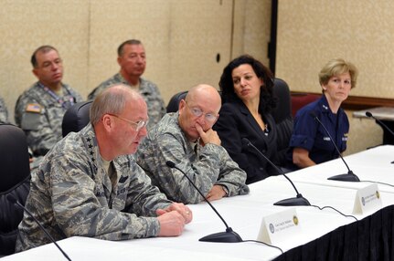 Air Force Gen. Craig McKinley, the chief of the National Guard Bureau, left, said Jan. 22, 2010, at the national States and Territories Hurricane Response Workshop in Tampa, Fla., that more agencies are communicating and collaborating better to prepare for domestic hurricane response. Also pictured are Air Force Gen. Victor E. Renuart, Jr., commander, Northern Command; Juliette Kayyem, assistant secretary, the Department of Homeland Security, and Rear Adm. Mary Landry, commander, 8th Coast Guard District. The National Guard Bureau and Northern Command co-sponsored the weeklong workshop hosted by the Florida National Guard.