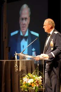 Air Force Gen. Craig R. McKinley, chief of the National Guard Bureau, speaks at the Military Ball of the Colorado National Guard Jan. 23, 2010 at the Colorado Convention Center in Denver. He was invited to help the Colorado Guard celebrate its 150th birthday.